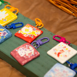 zodiac keychains, grouped together on one of our display tables